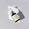 Dark amber glass pump bottle of enune Lipid Elixier face oil
