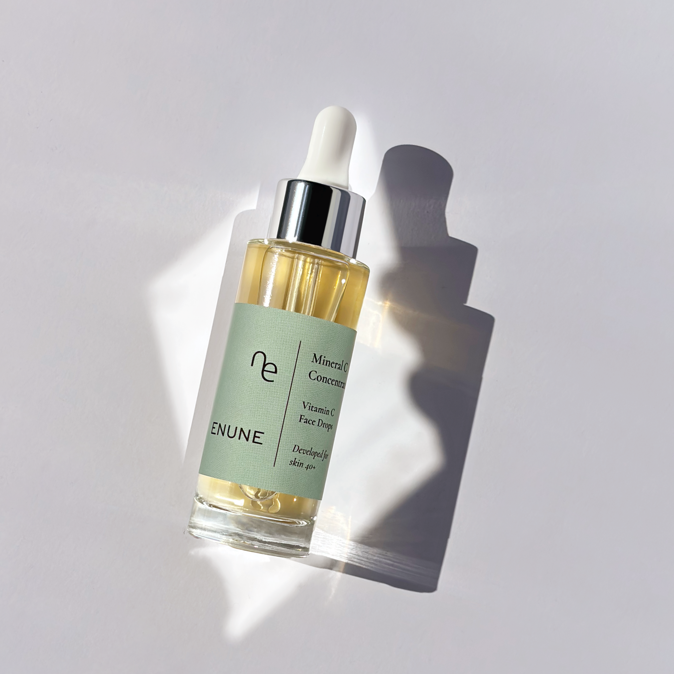 ENUNE Mineral C Concentrate glass dropper bottle with silver cap on white background
